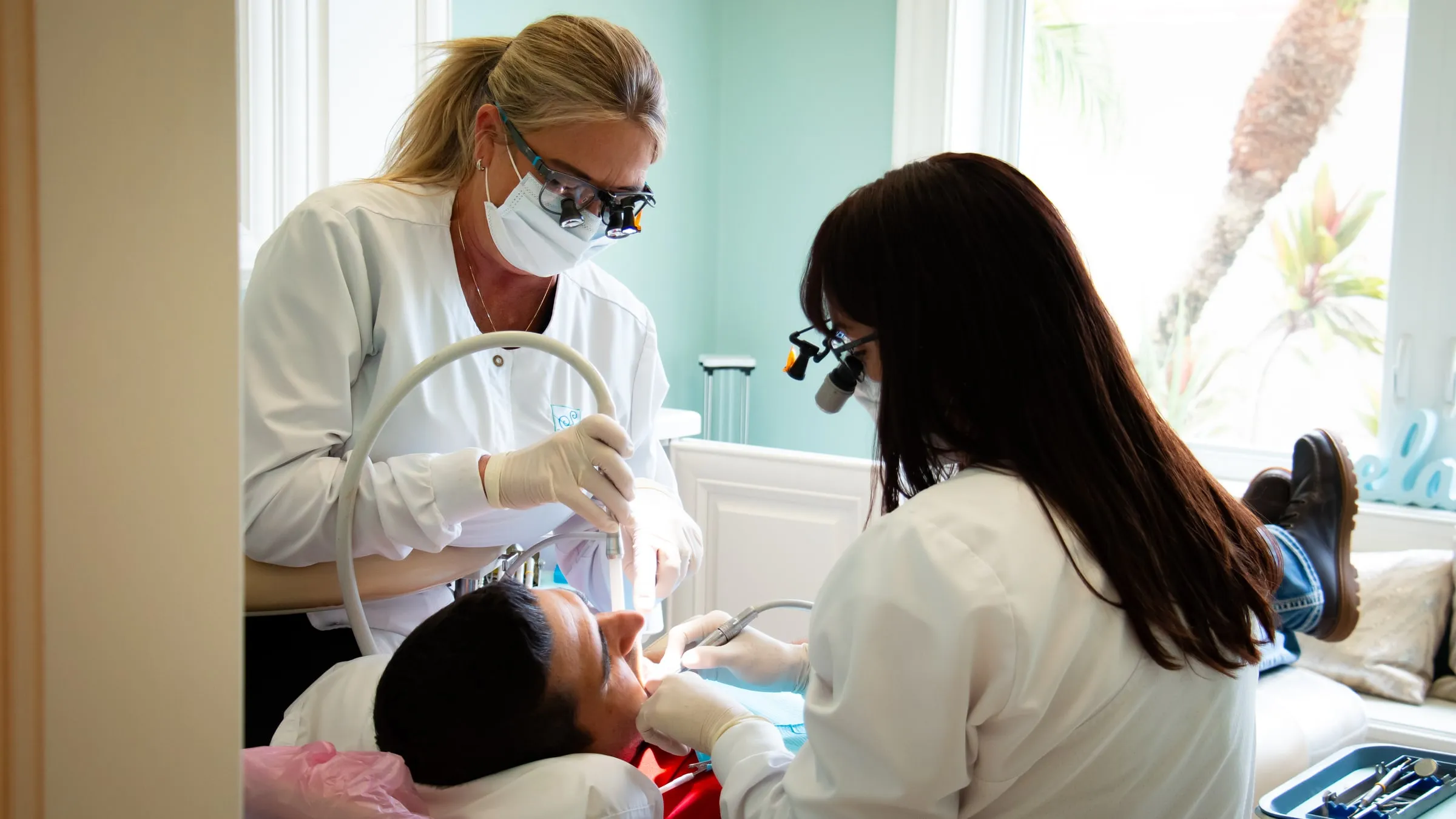 Dr. Jenifer Back with a clinician at Sarasota Smile Design in Sarasota, Florida