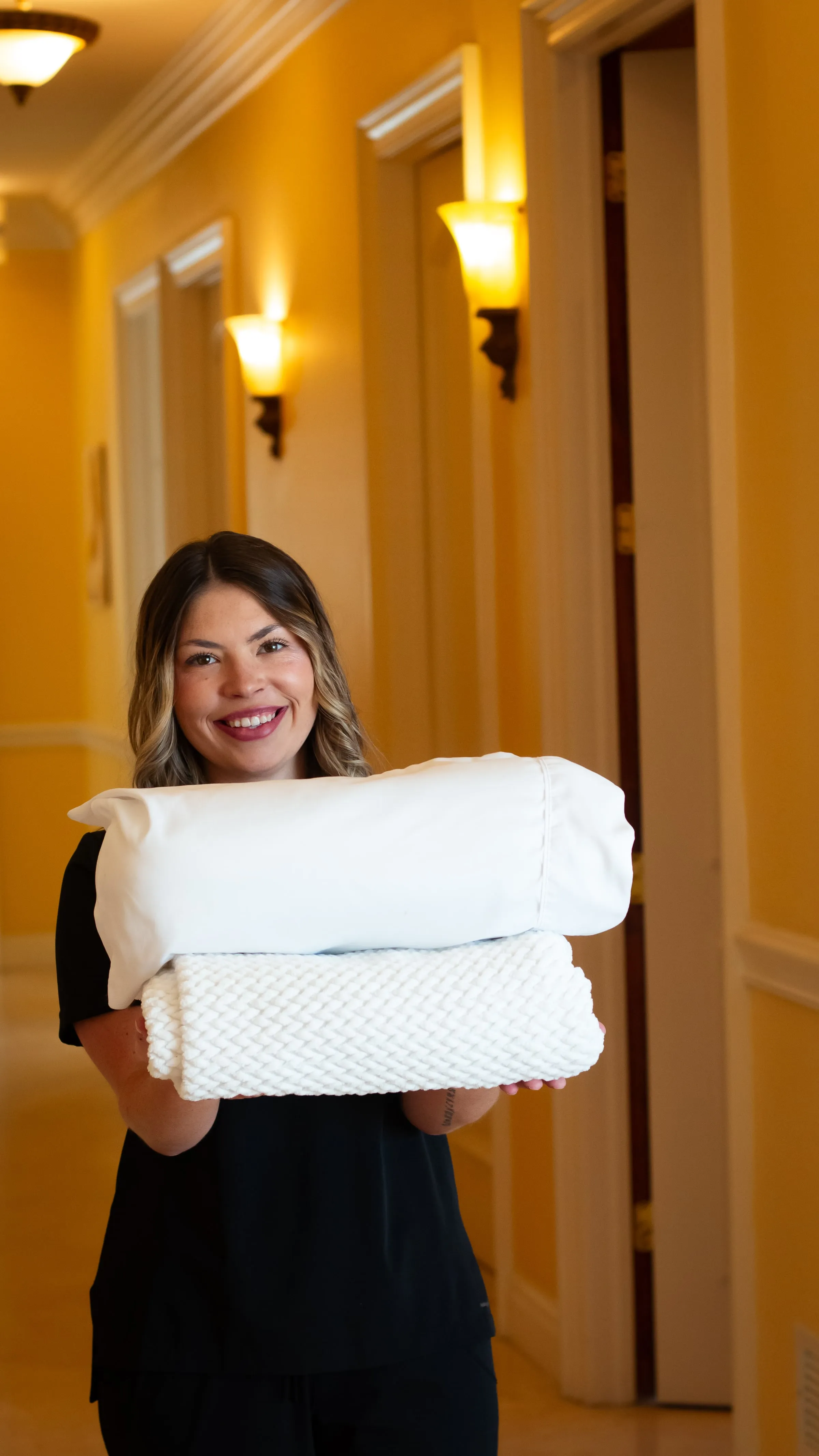 Folded blankets ready for patients at Sarasota Smile Design in Sarasota, Florida