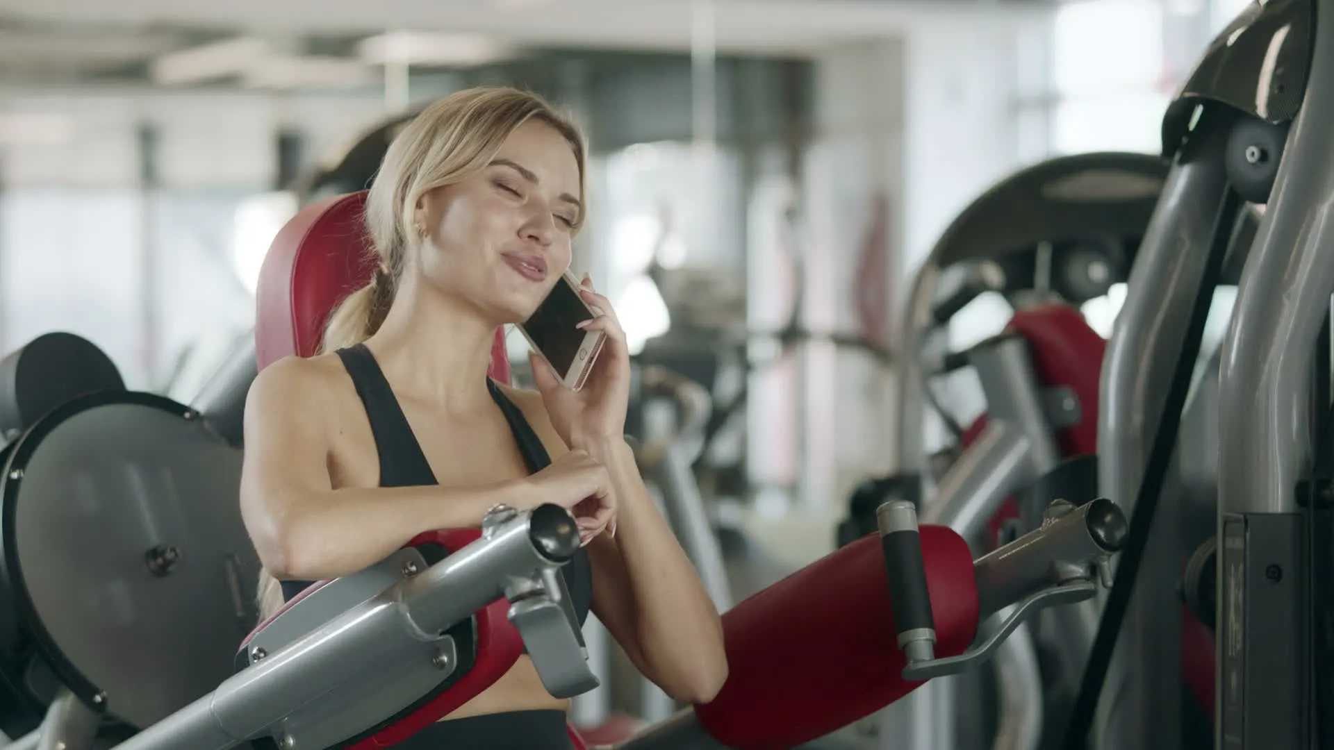A woman smiling after a workout