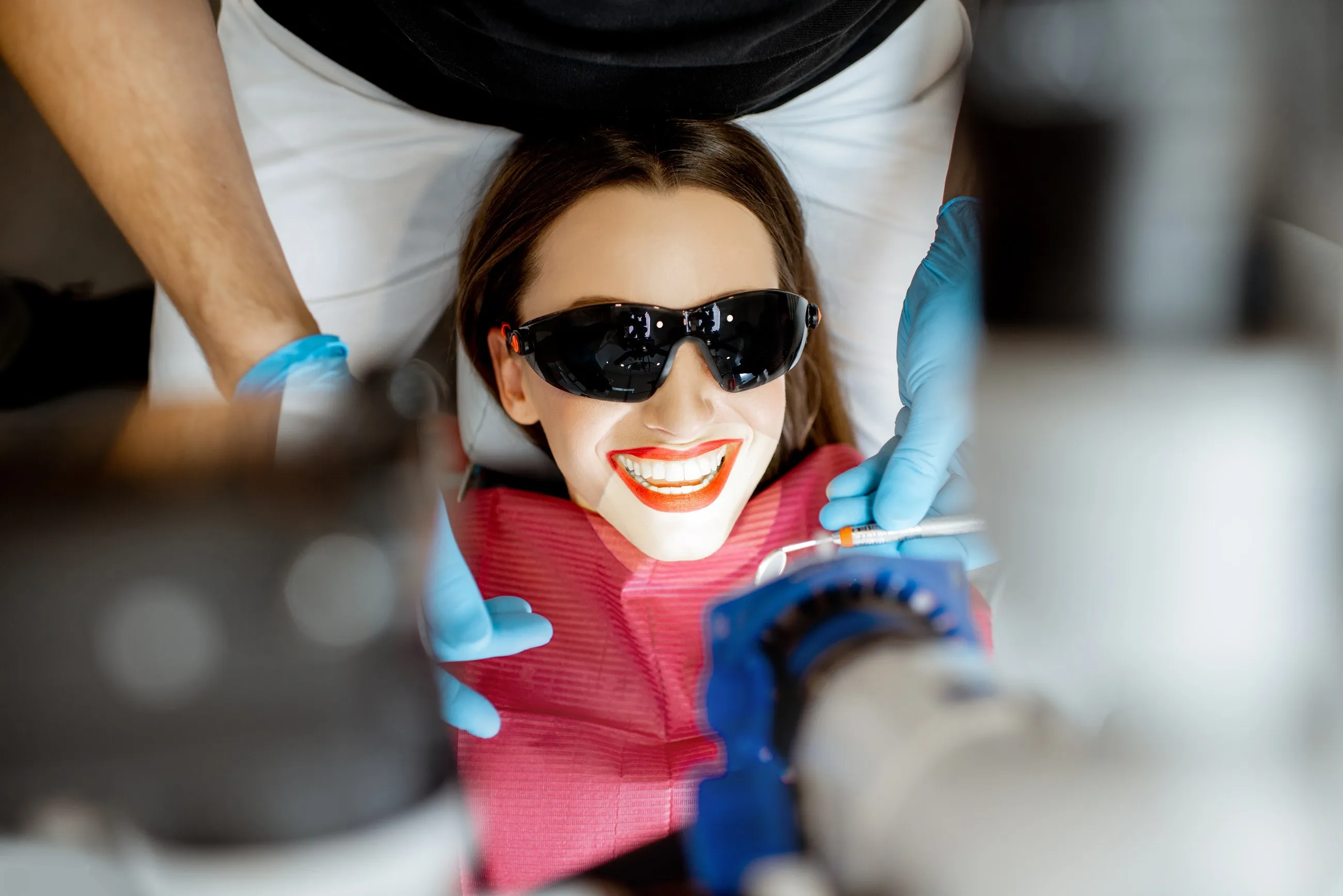 A patient smiling in the chair